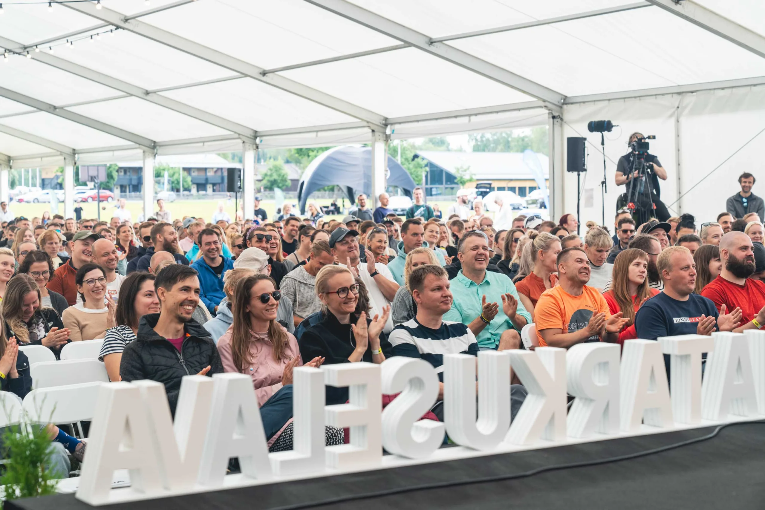 Fotograaf Mailis Vahenurm pildistas ürituse foto sündmusel Investeerimisfestival.